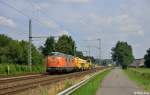221 134-0 mit einem Bauzug am 28.07.2014 bei Brokstedt.
