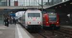 101 034-7 neben einem ET425 der S-Bahn Rhein-Necker in Heidelberg Hbf.