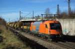 RTS 1216 902 mit Bauzug durch Waldtrudering.