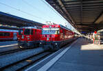 Zwei Generation von RbB Lokomotiven nebeneinander....
Im Vordergrund die RhB Ge 4/4 III – 647 „Grüsch“ und dahinter die RhB Ge 4/4 II -  „Bergün / Bravuogn“ am 05.09.2021 im Bahnhof Chur.