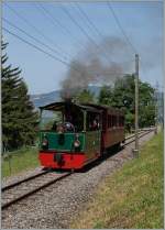 Dampftram G2/2 N° 4  Rimini  (1900) mit einem NStCM Wagen auf kurz vor Chaulin.