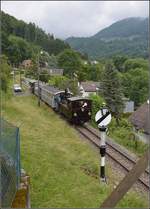 G 3/3 6 mit BAM-Nummer und einem kurzen bunten Personenzug in Blonay.