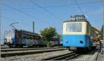 Der Beh 2/4 207 und Beh 4/8 302 in Glion.