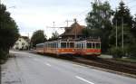 Auf seiner Fahrt von Niederbipp nach Solothurn �berholt Be 4/4 103 den im Bahnhof Buchli wartenden Be 4/4 302 (Juli 1997)