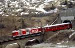 Im Mai 1980 trifft ein Deh 4/4 der Furka-Oberalp-Bahn (FO) mit einem Personenzug aus Andermatt in G�schenen ein